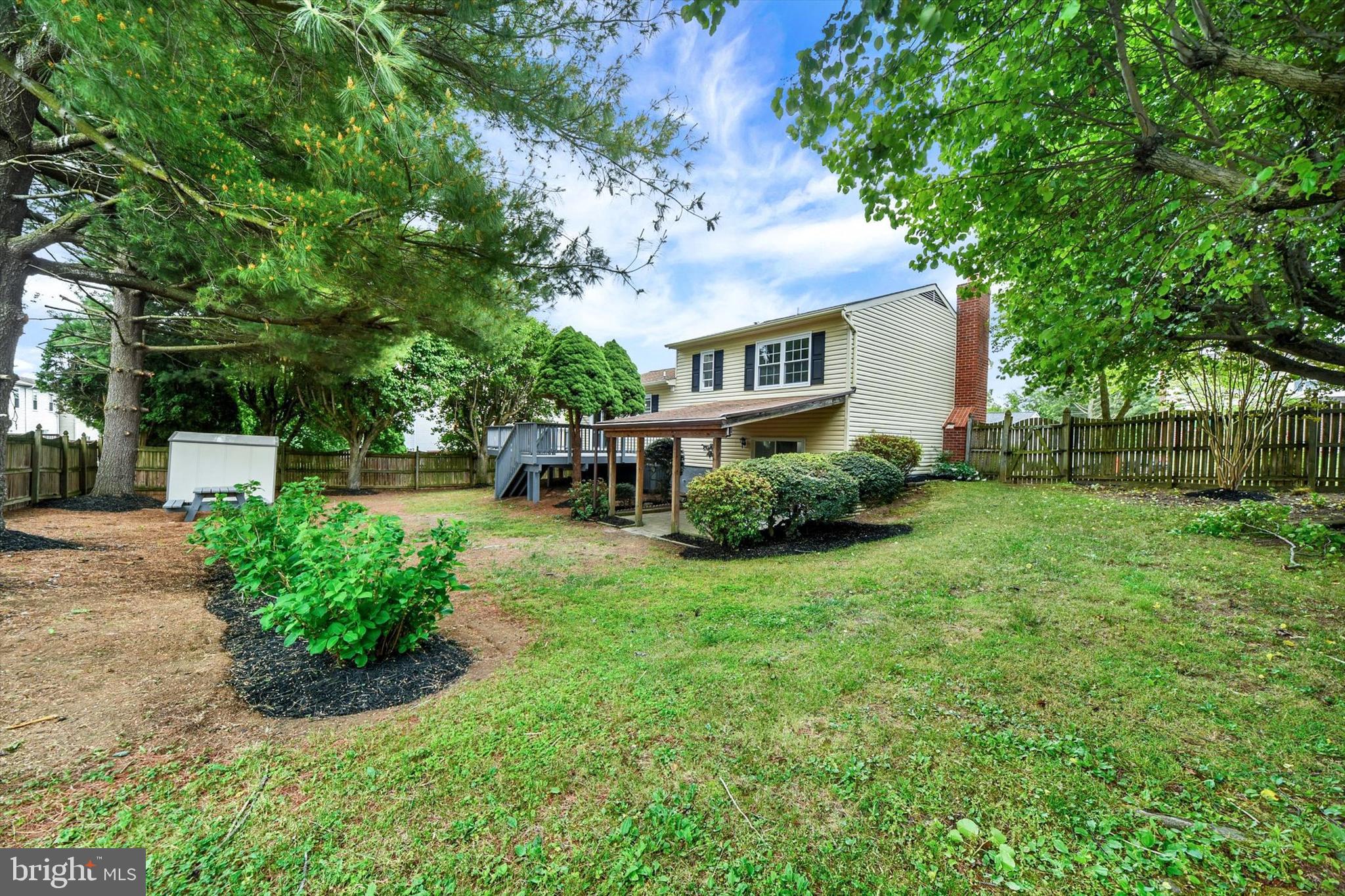 3808 Perryhurst Place Baltimore, MD 21236 - Photo 29 of 29 a front view of a house with garden