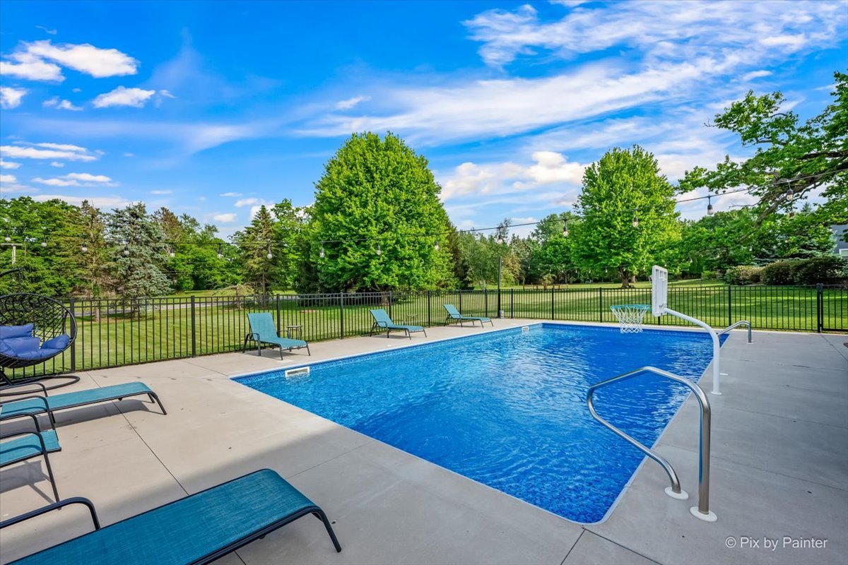 7104 Dove Way Cary, IL 60013 - Photo 65 of 82 a view of a backyard with swimming pool