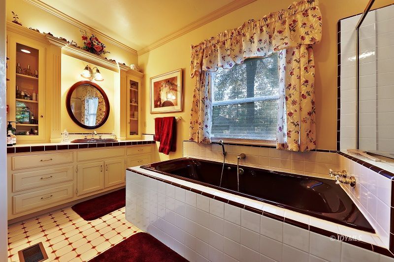 36285 Tool Road Mountain Center, CA 92561 - Photo 22 of 47 a bathroom with a sink a mirror and a bathtub