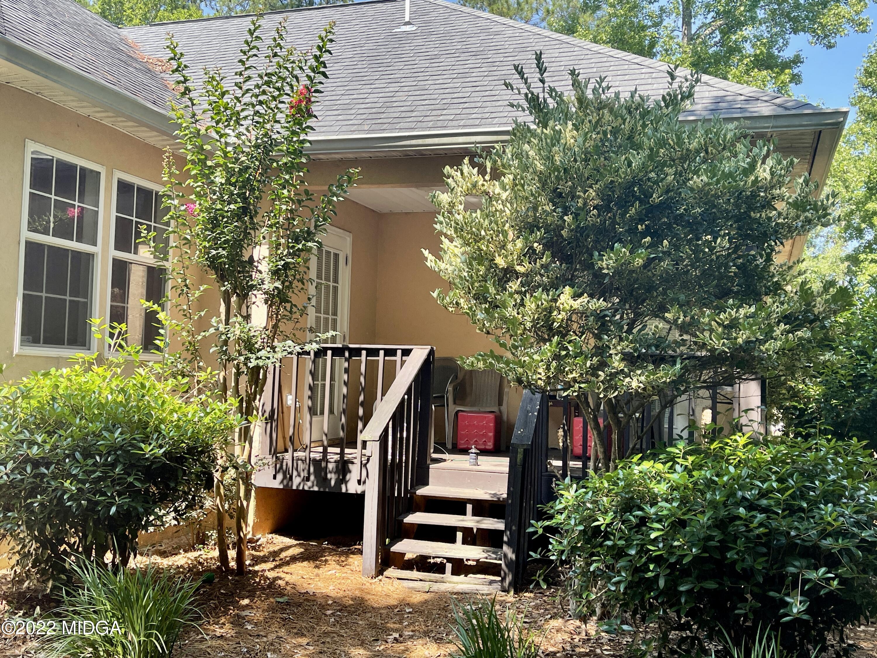 105 Carrs Station Road Sparta, GA 31087 - Photo 19 of 21 a backyard of a house with lots of green space