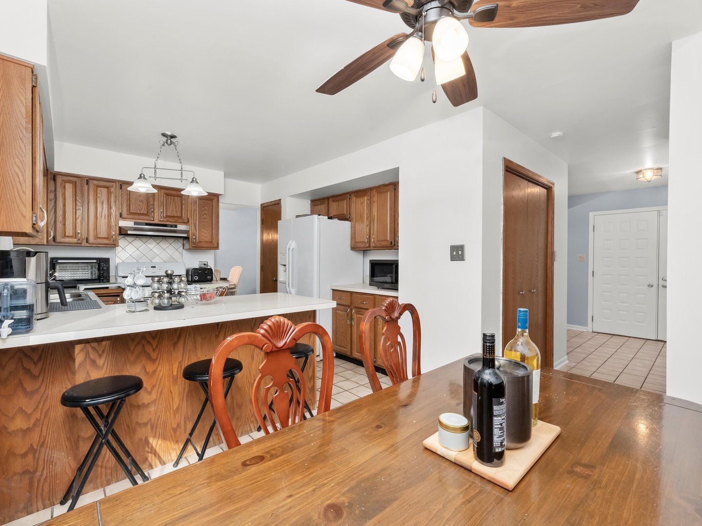 3604 Tee Court North Crete, IL 60417 - Photo 11 of 37 a very nice looking dining room with a dining table chairs and chandelier