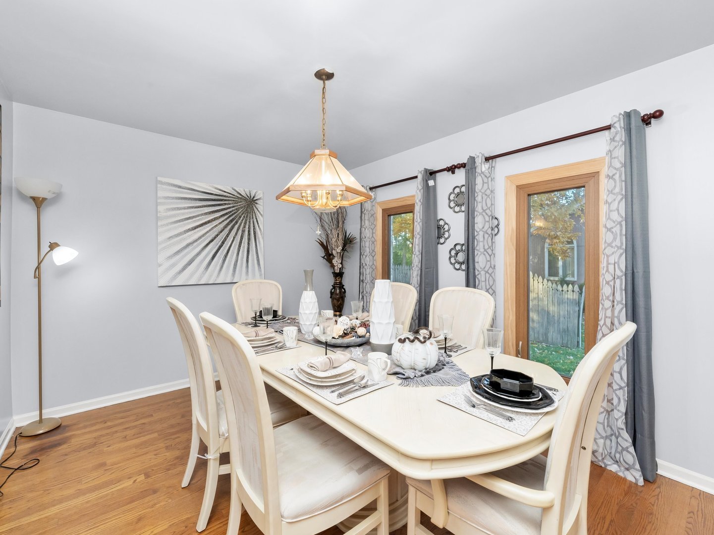 3604 Tee Court North Crete, IL 60417 - Photo 19 of 37 a dining room with furniture a chandelier and wooden floor