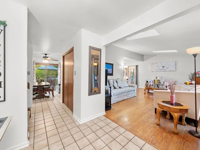 a living room with furniture and a table