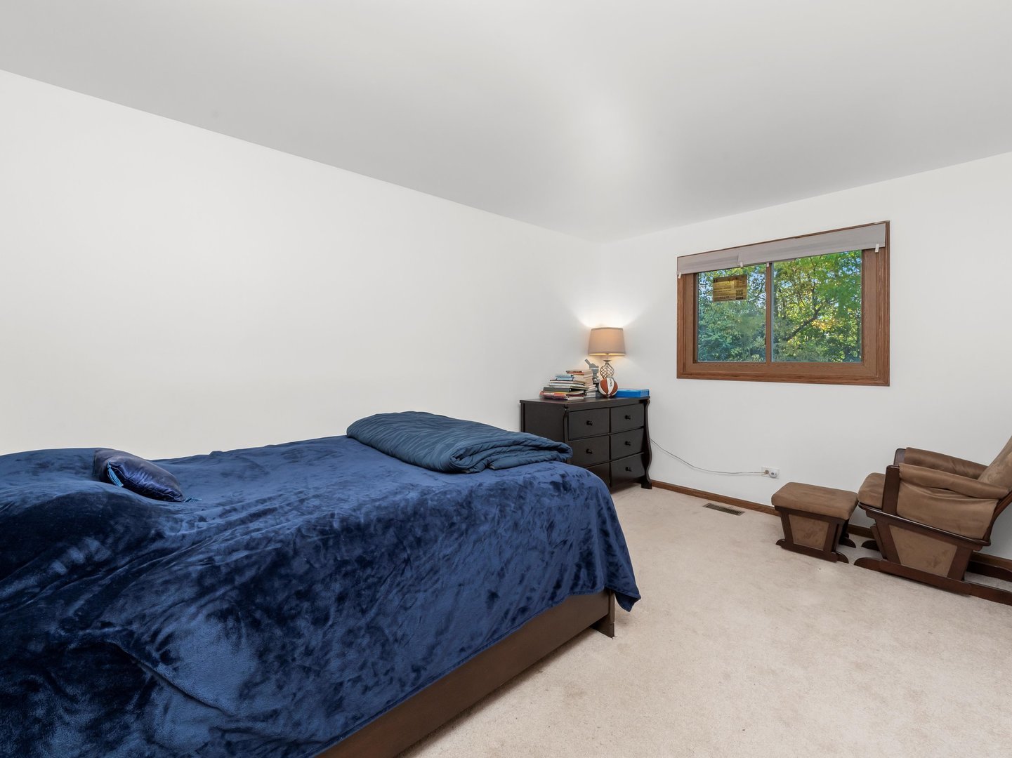 3604 Tee Court North Crete, IL 60417 - Photo 25 of 37 a spacious bedroom with a bed and a couch in it