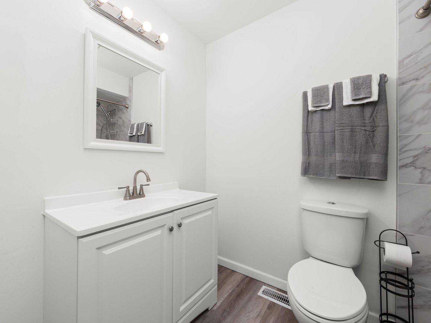 3604 Tee Court North Crete, IL 60417 - Photo 28 of 37 a bathroom with a toilet a sink and mirror
