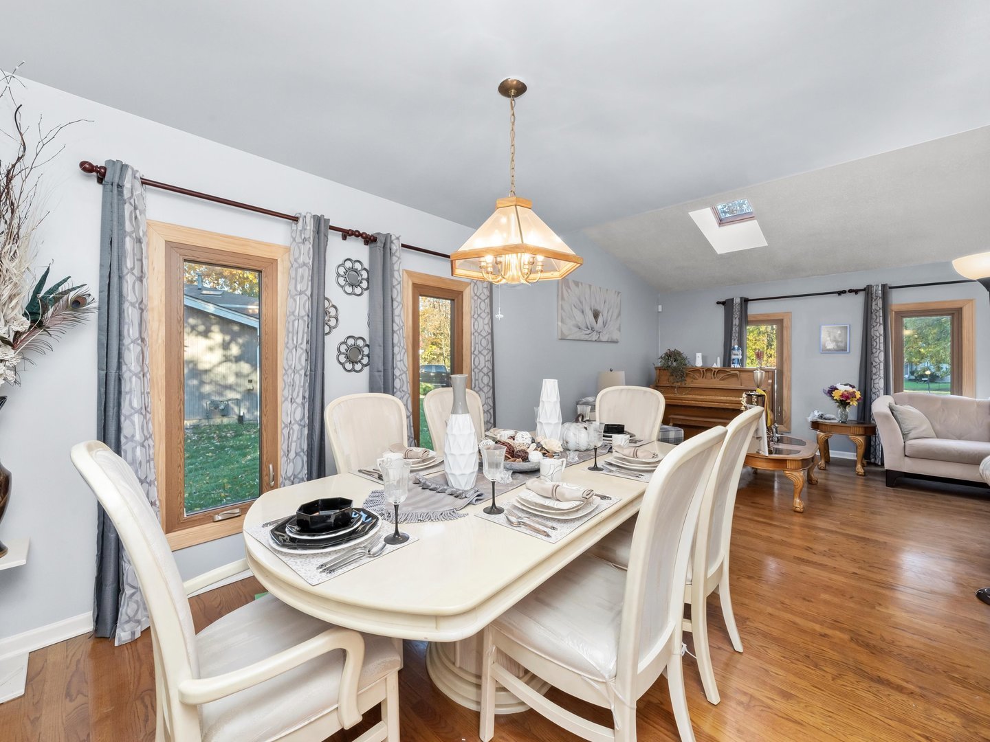 3604 Tee Court North Crete, IL 60417 - Photo 8 of 37 a dining room with furniture a chandelier and wooden floor