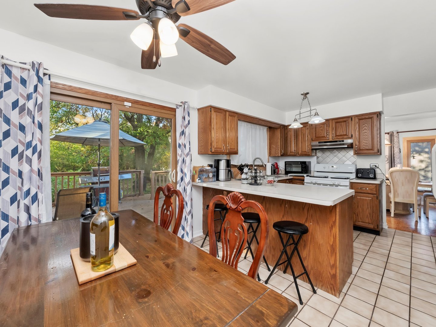 3604 Tee Court North Crete, IL 60417 - Photo 10 of 37 a kitchen with stainless steel appliances granite countertop a stove a sink dishwasher and a refrigerator with wooden floor