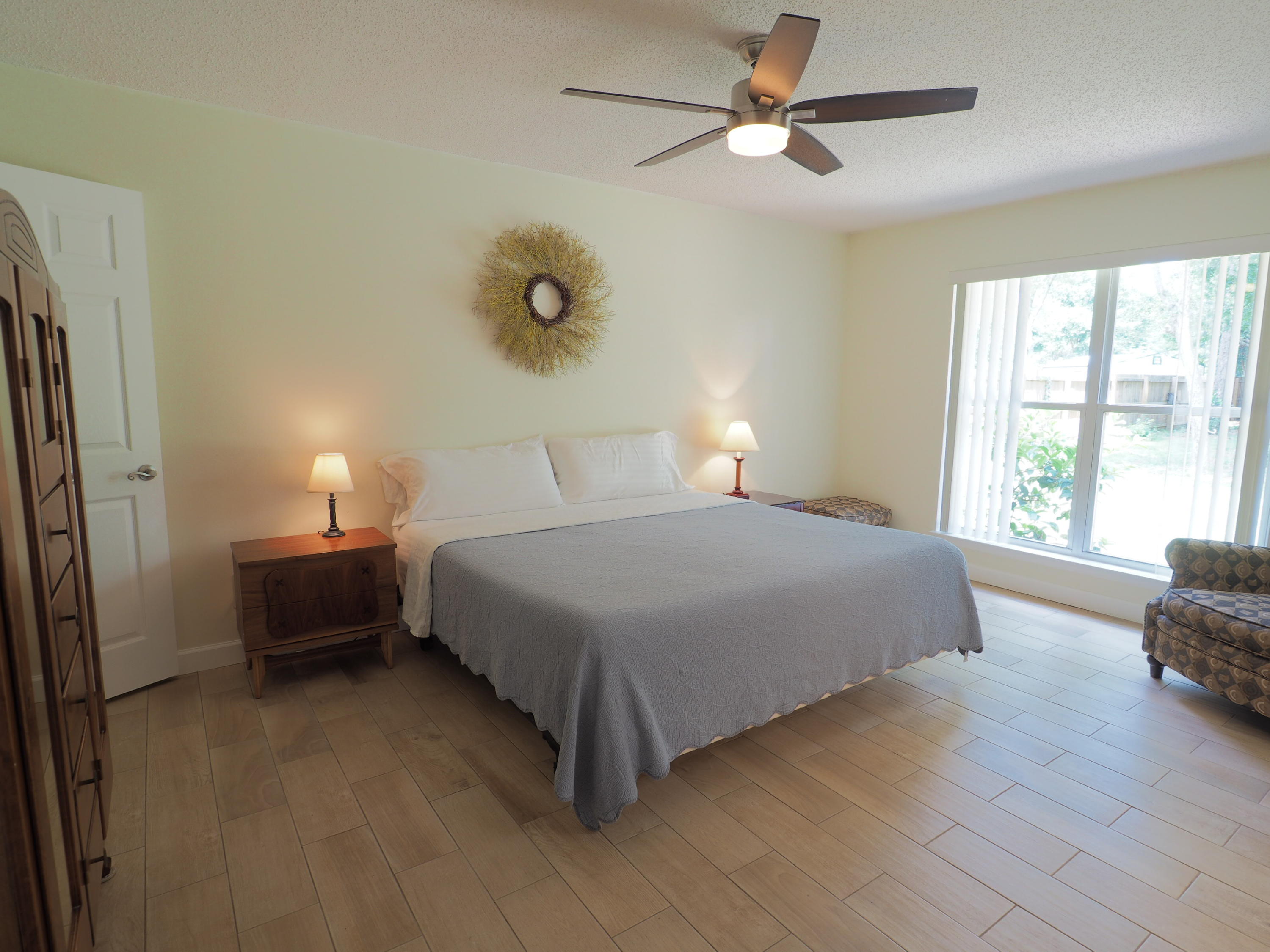 2803 Ram Lane Crestview, FL 32539 - Photo 14 of 35 a bedroom with a bed and a window