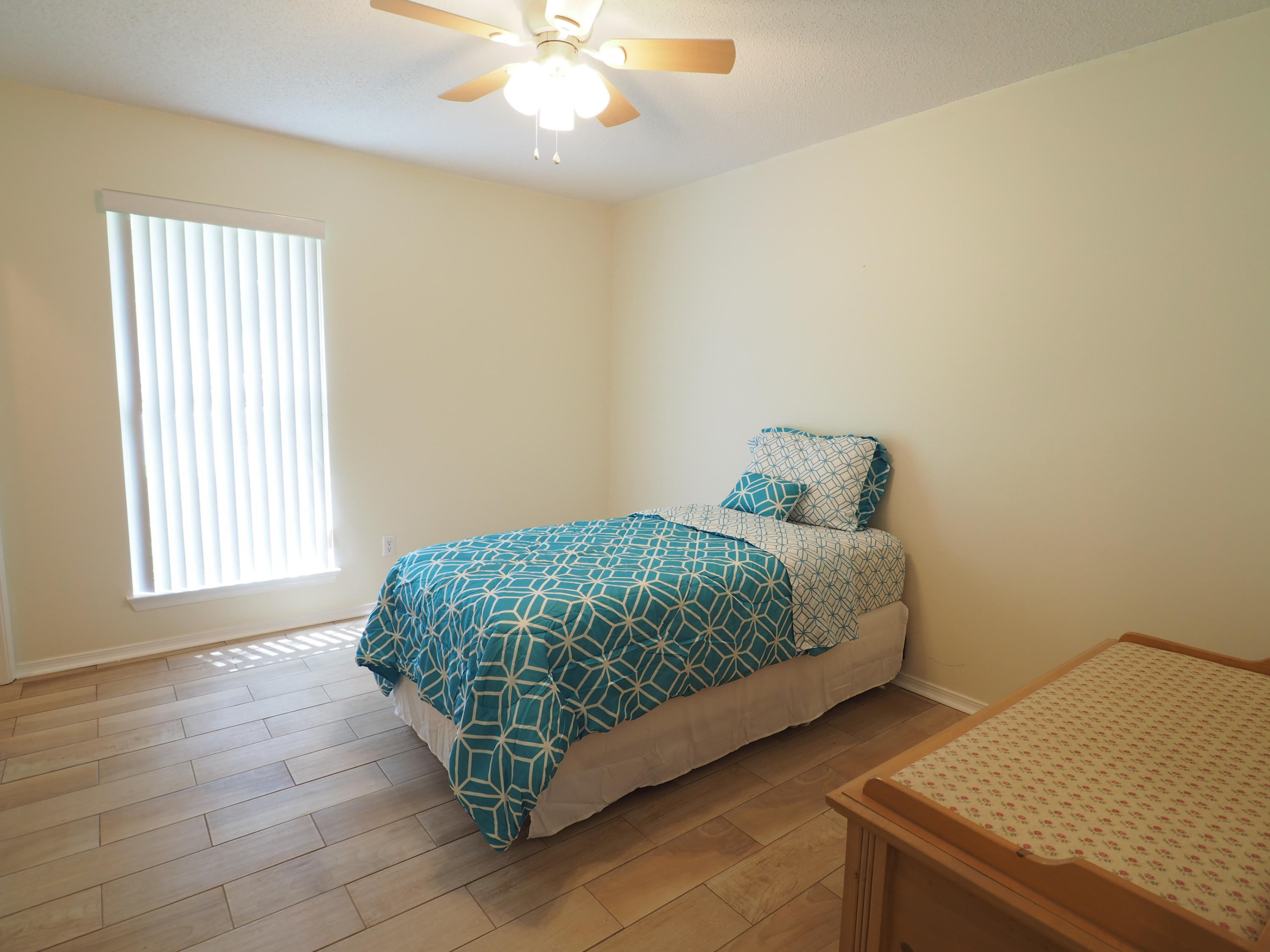 2803 Ram Lane Crestview, FL 32539 - Photo 18 of 35 a bedroom with a bed and a window