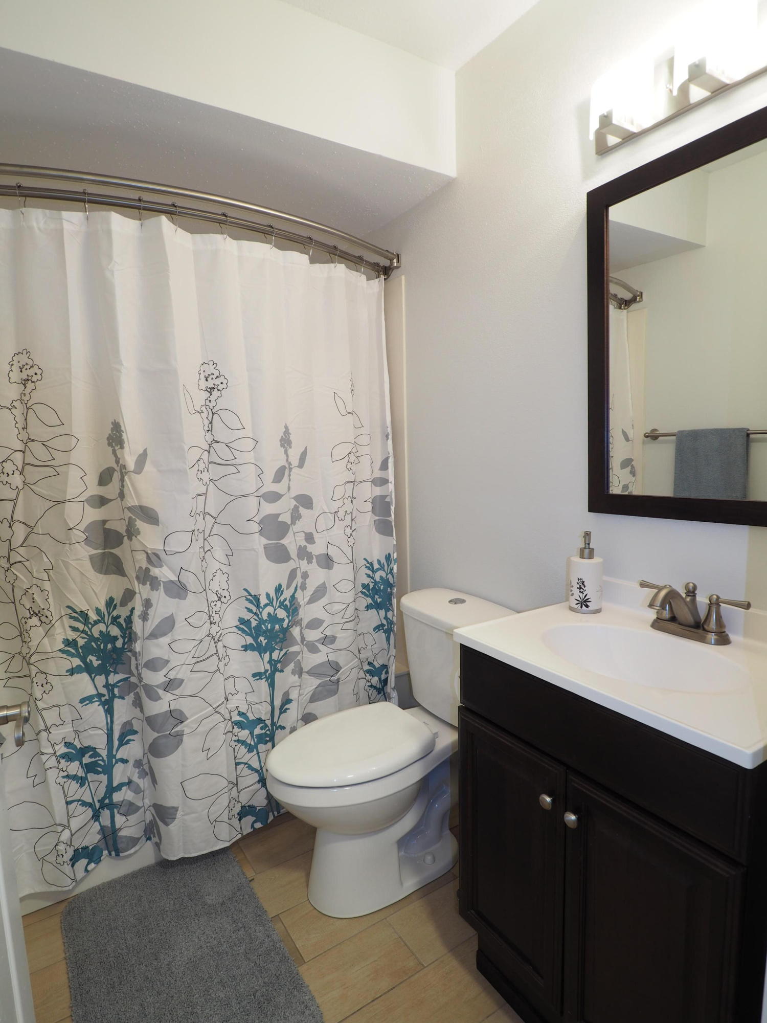 2803 Ram Lane Crestview, FL 32539 - Photo 20 of 35 a bathroom with a toilet sink and mirror