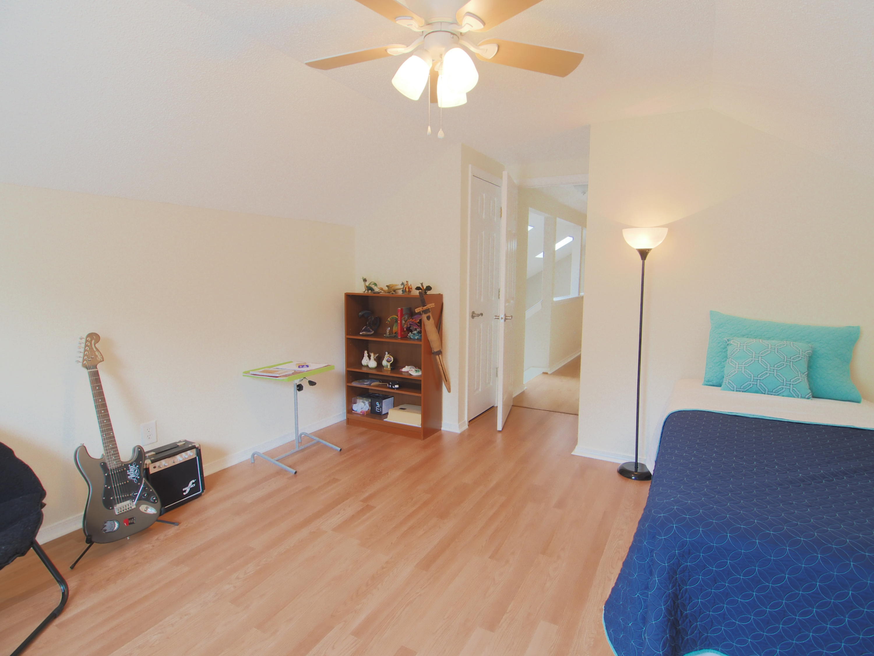 2803 Ram Lane Crestview, FL 32539 - Photo 26 of 35 a view of a room with furniture and wooden floor