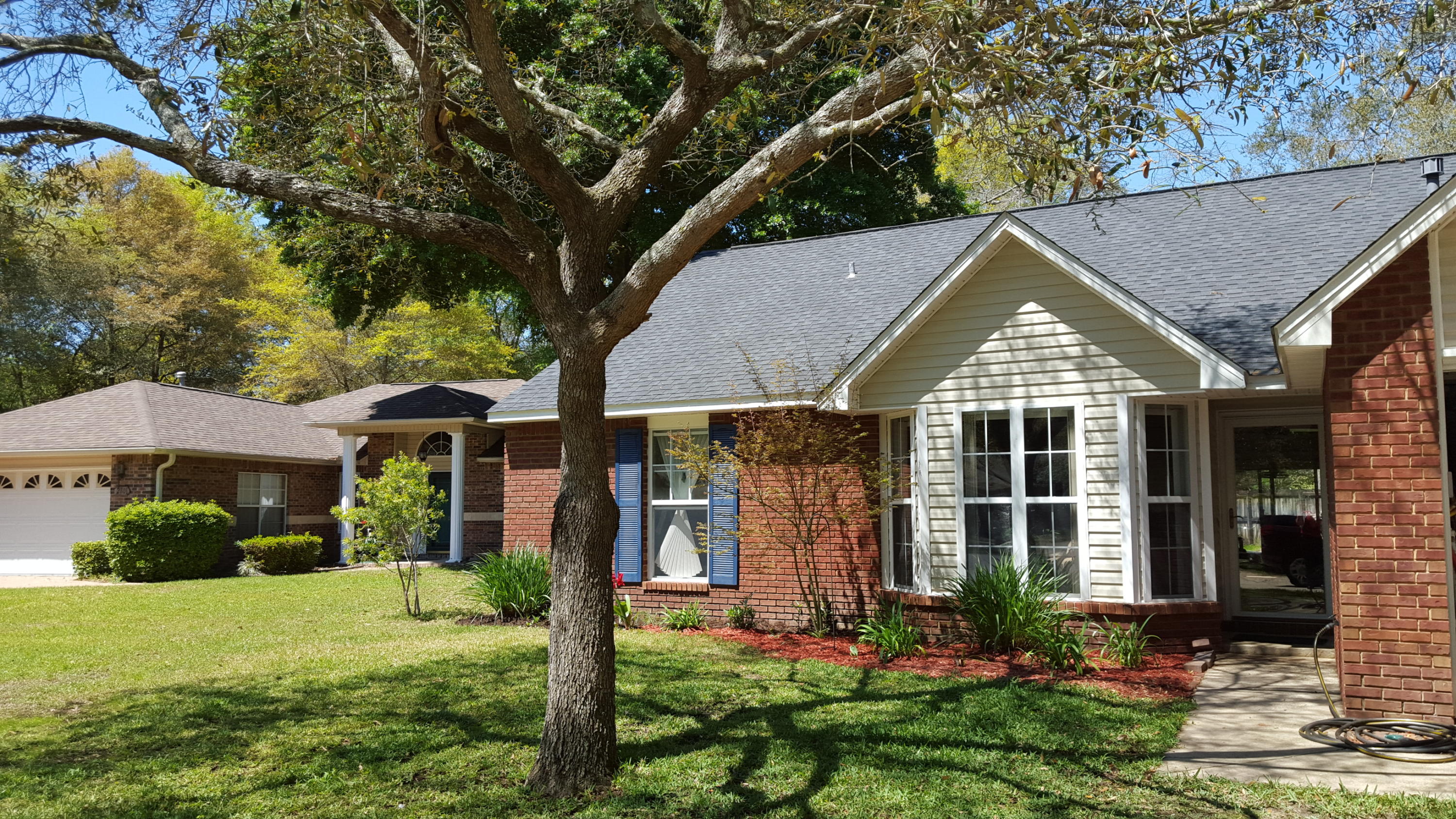 2803 Ram Lane Crestview, FL 32539 - Photo 35 of 35 a front view of a house with garden