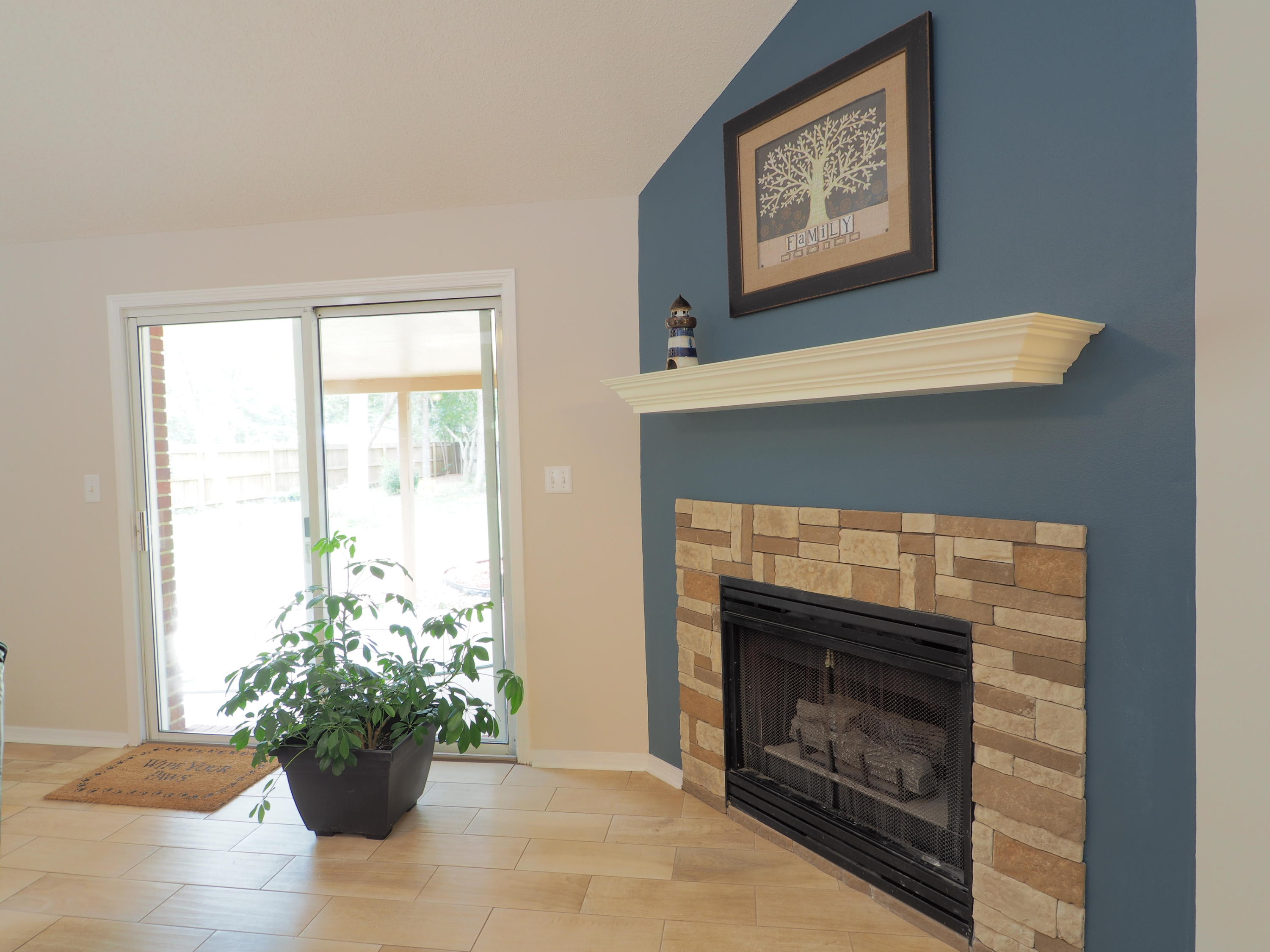 2803 Ram Lane Crestview, FL 32539 - Photo 5 of 35 a living room with furniture and a fireplace