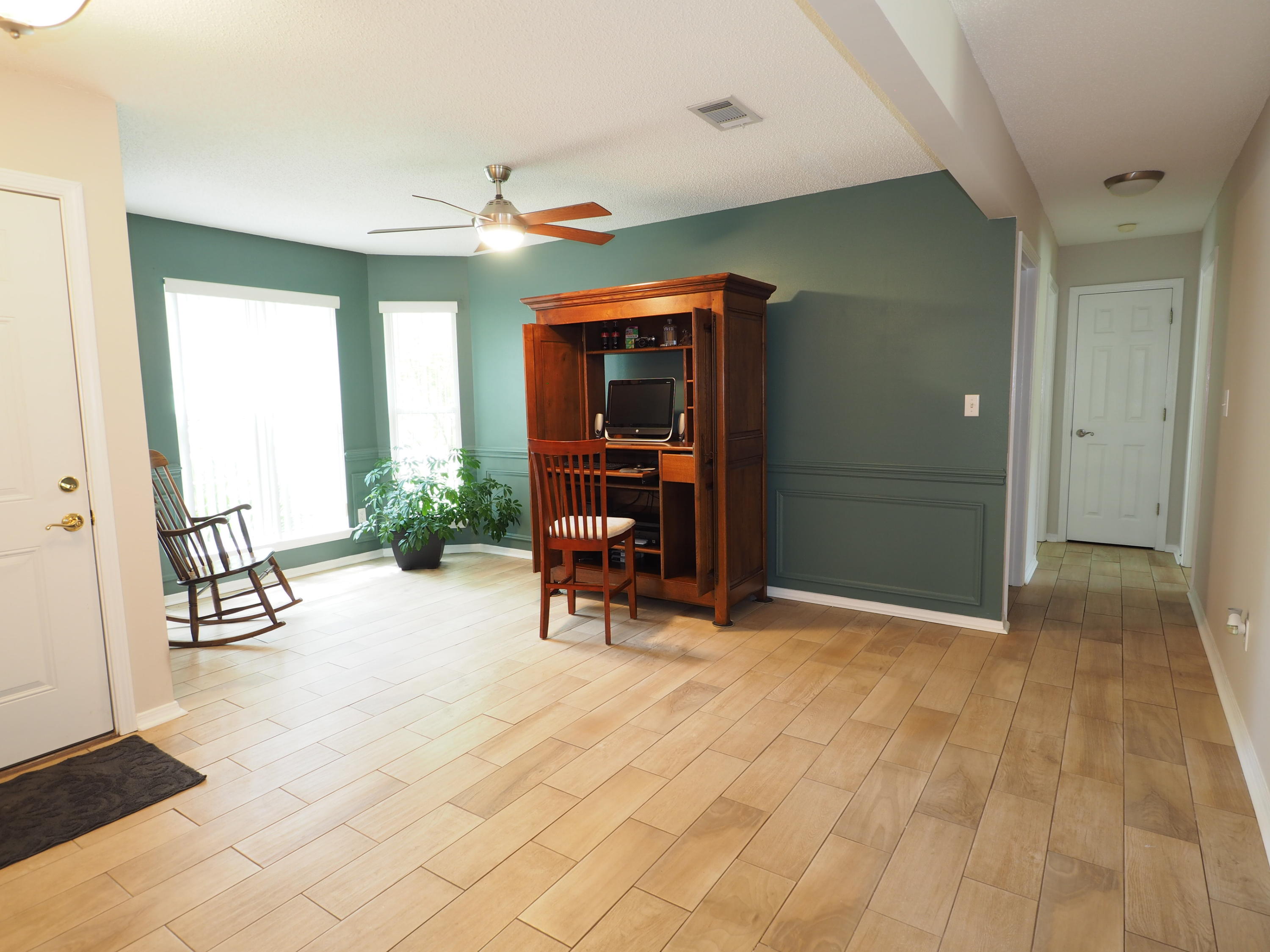 2803 Ram Lane Crestview, FL 32539 - Photo 7 of 35 a view of a livingroom with furniture and a window