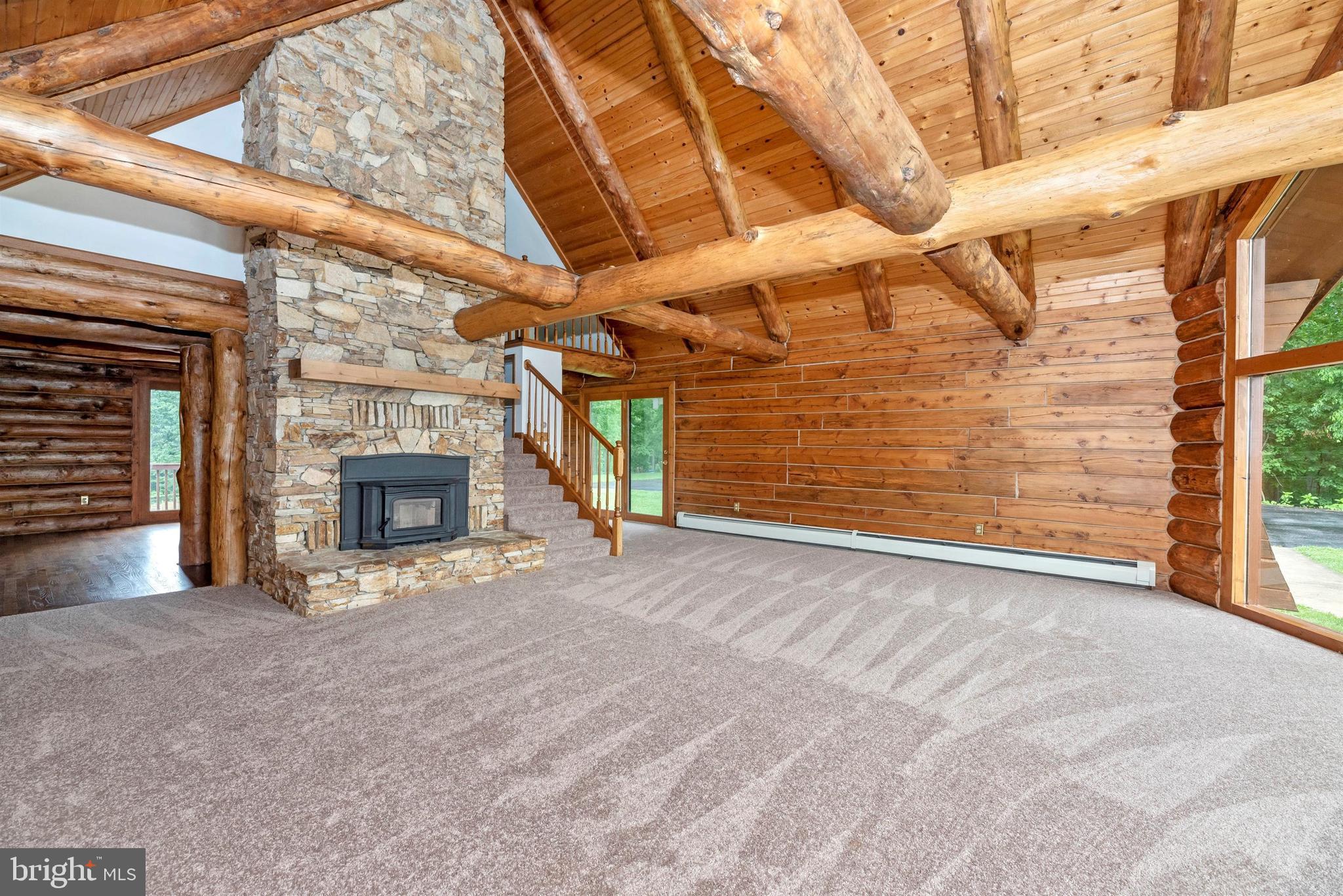8399 Mapleville Road Mount Airy, MD 21771 - Photo 17 of 64 Gorgeous stone fireplace.