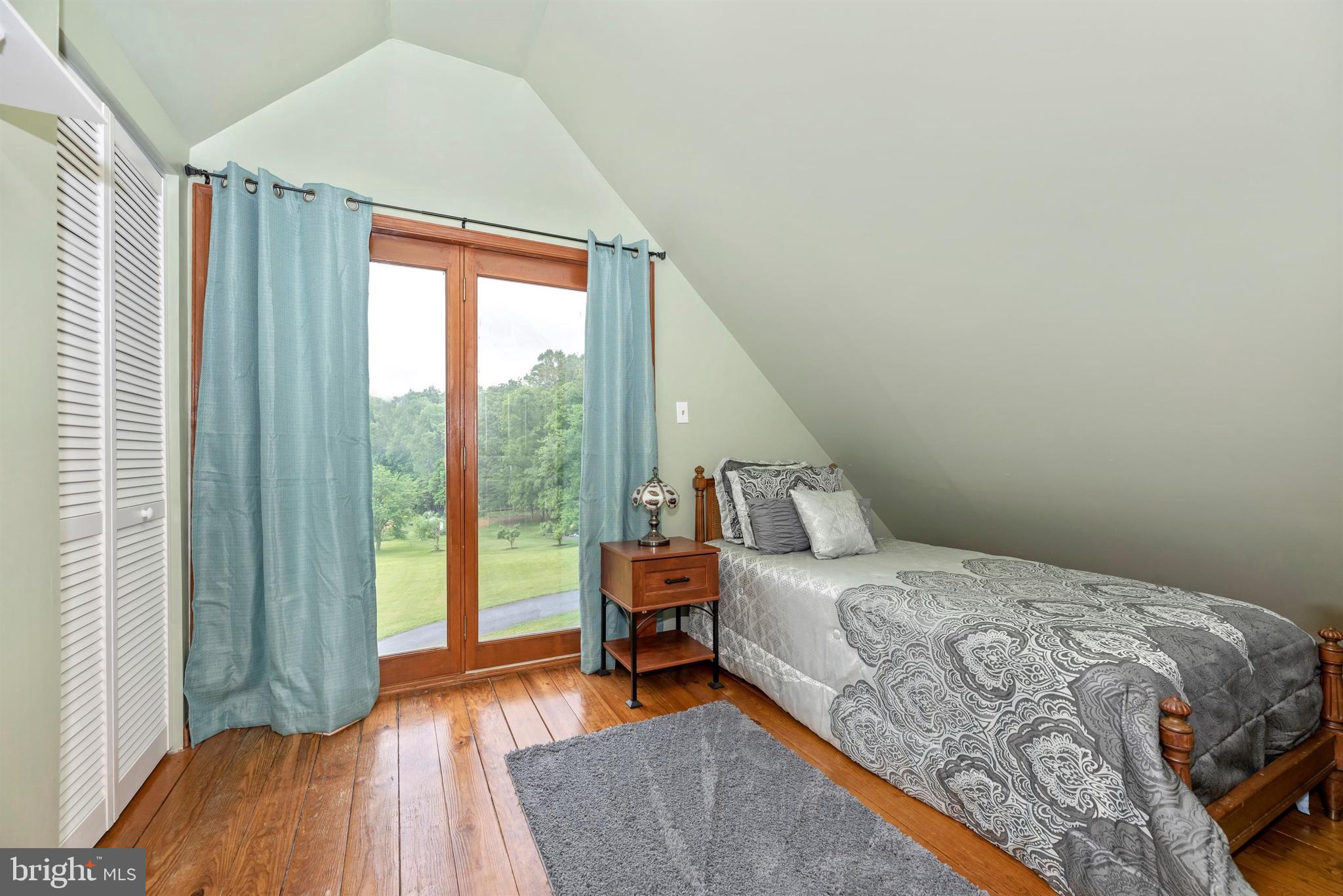 8399 Mapleville Road Mount Airy, MD 21771 - Photo 32 of 64 2nd bedroom with hardwood floors.