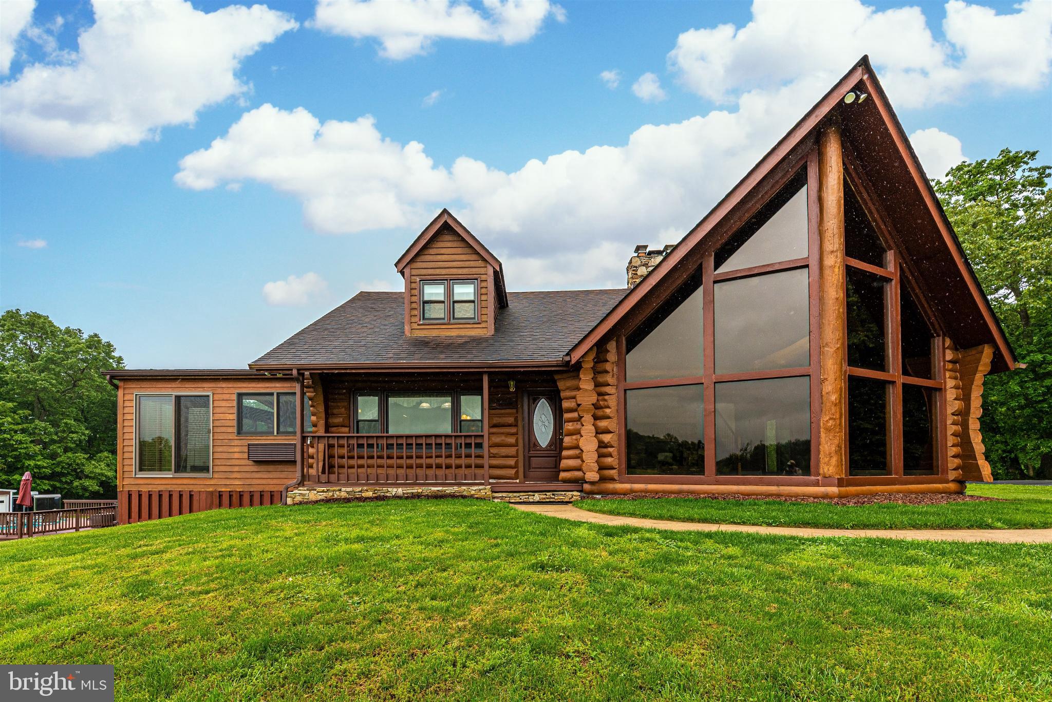 8399 Mapleville Road Mount Airy, MD 21771 - Photo 61 of 64 Floor to ceiling windows in family room.
