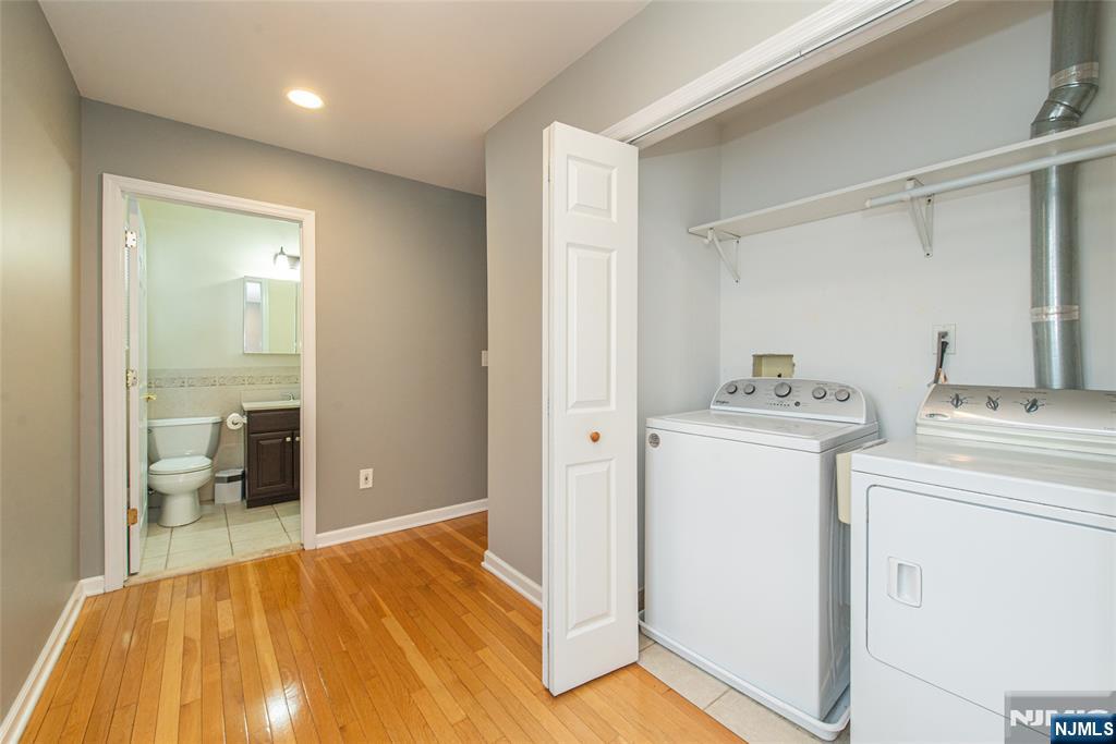 73 Grove Street Clifton, NJ 07013 - Photo 23 of 49 a room that has a bed and a view of bathroom