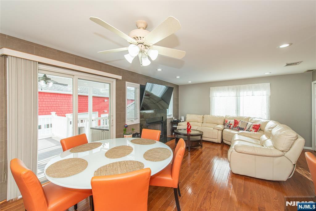 73 Grove Street Clifton, NJ 07013 - Photo 37 of 49 a living room with fireplace furniture and a large window