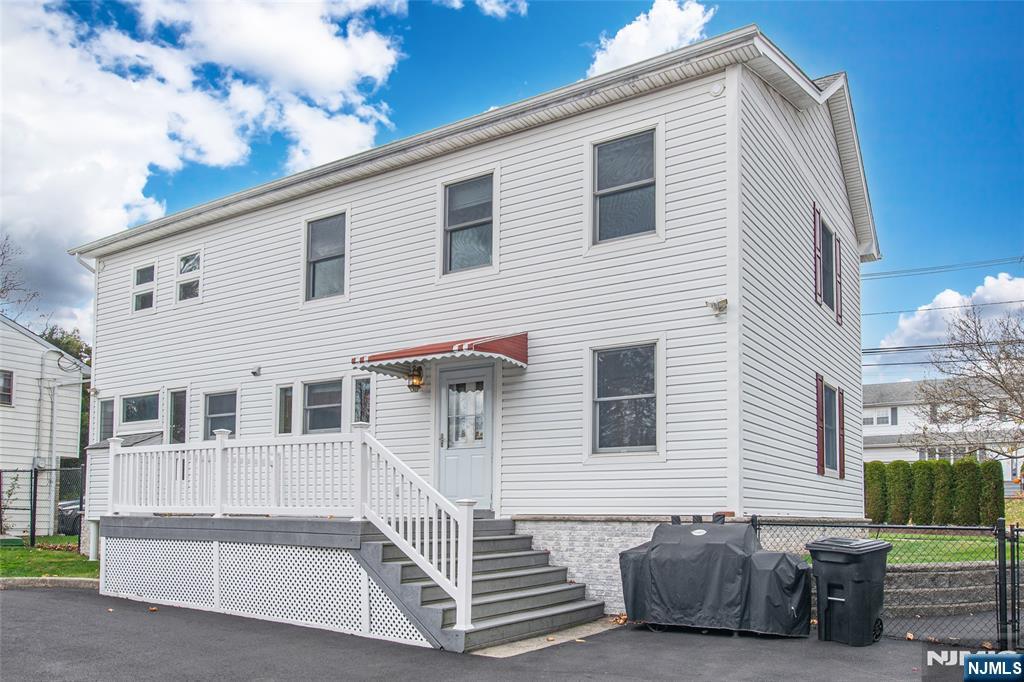 73 Grove Street Clifton, NJ 07013 - Photo 8 of 49 a view of a house with a balcony