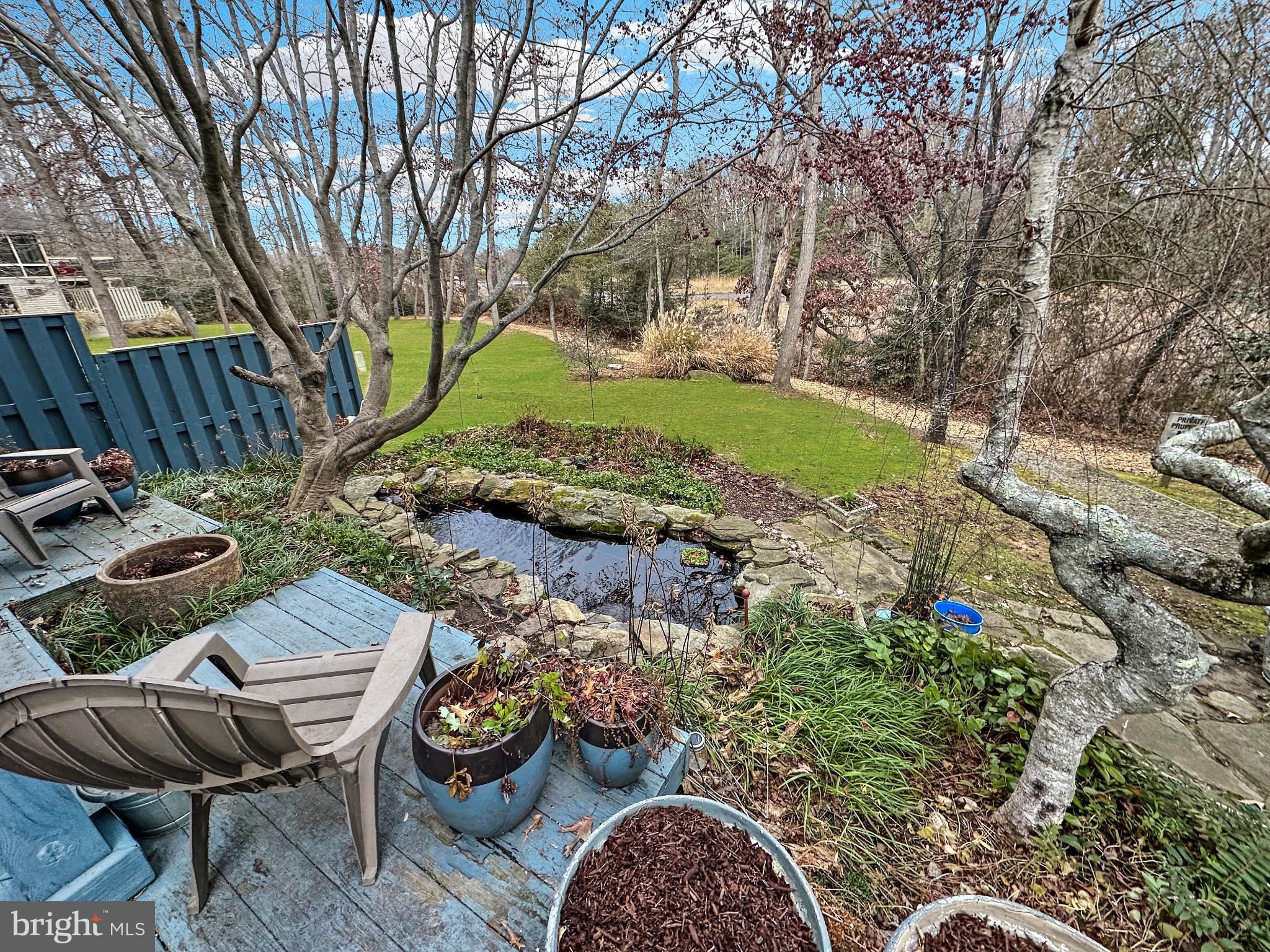 518 Fawns Walk Annapolis, MD 21409 - Photo 18 of 29 a backyard of a house with barbeque oven and outdoor seating