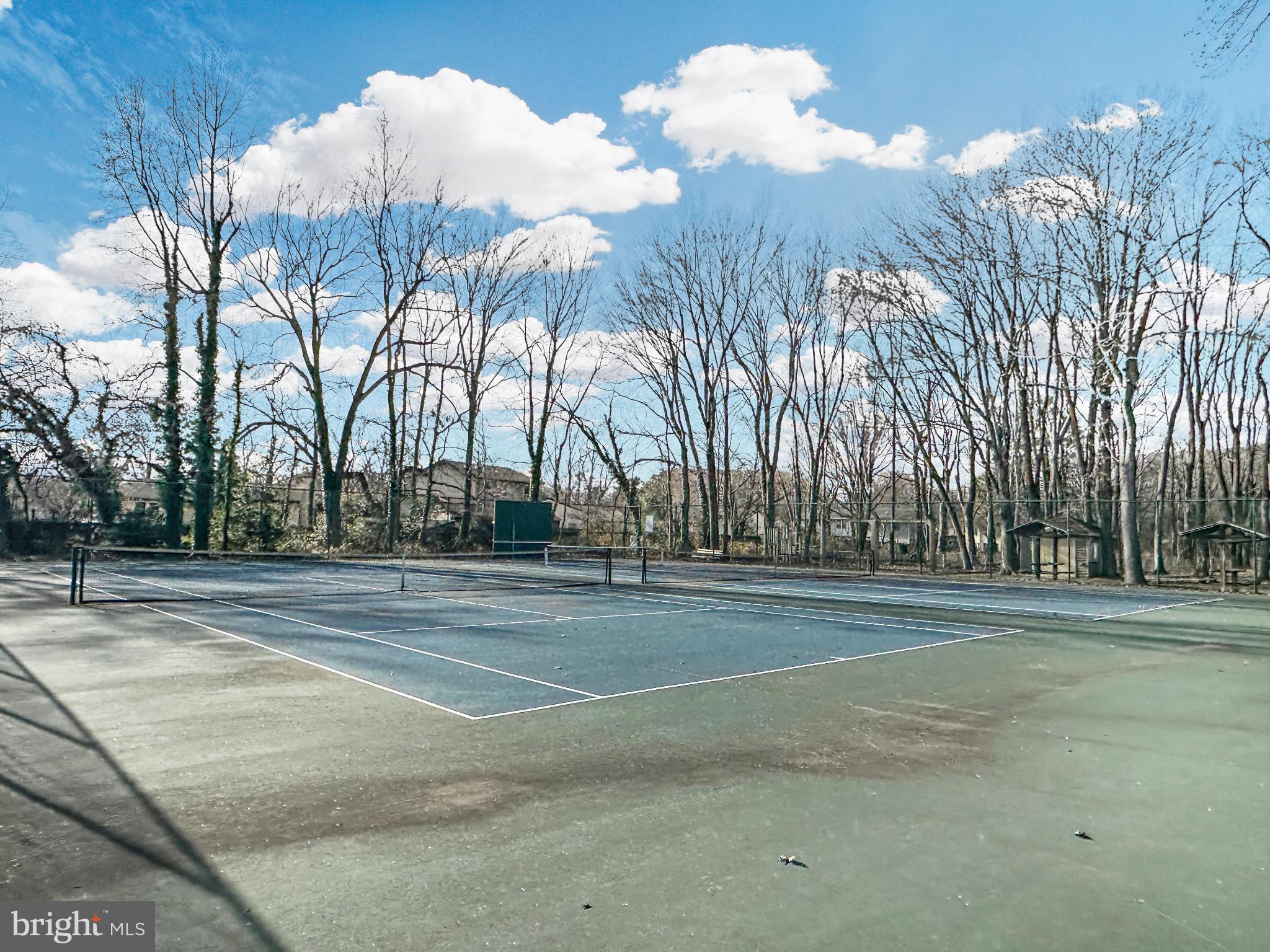 518 Fawns Walk Annapolis, MD 21409 - Photo 24 of 29 a tall building with trees in the background
