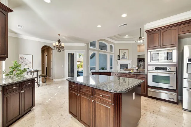 a view of a livingroom with furniture window and front door
