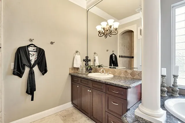 an aerial view of multiple houses with outdoor space