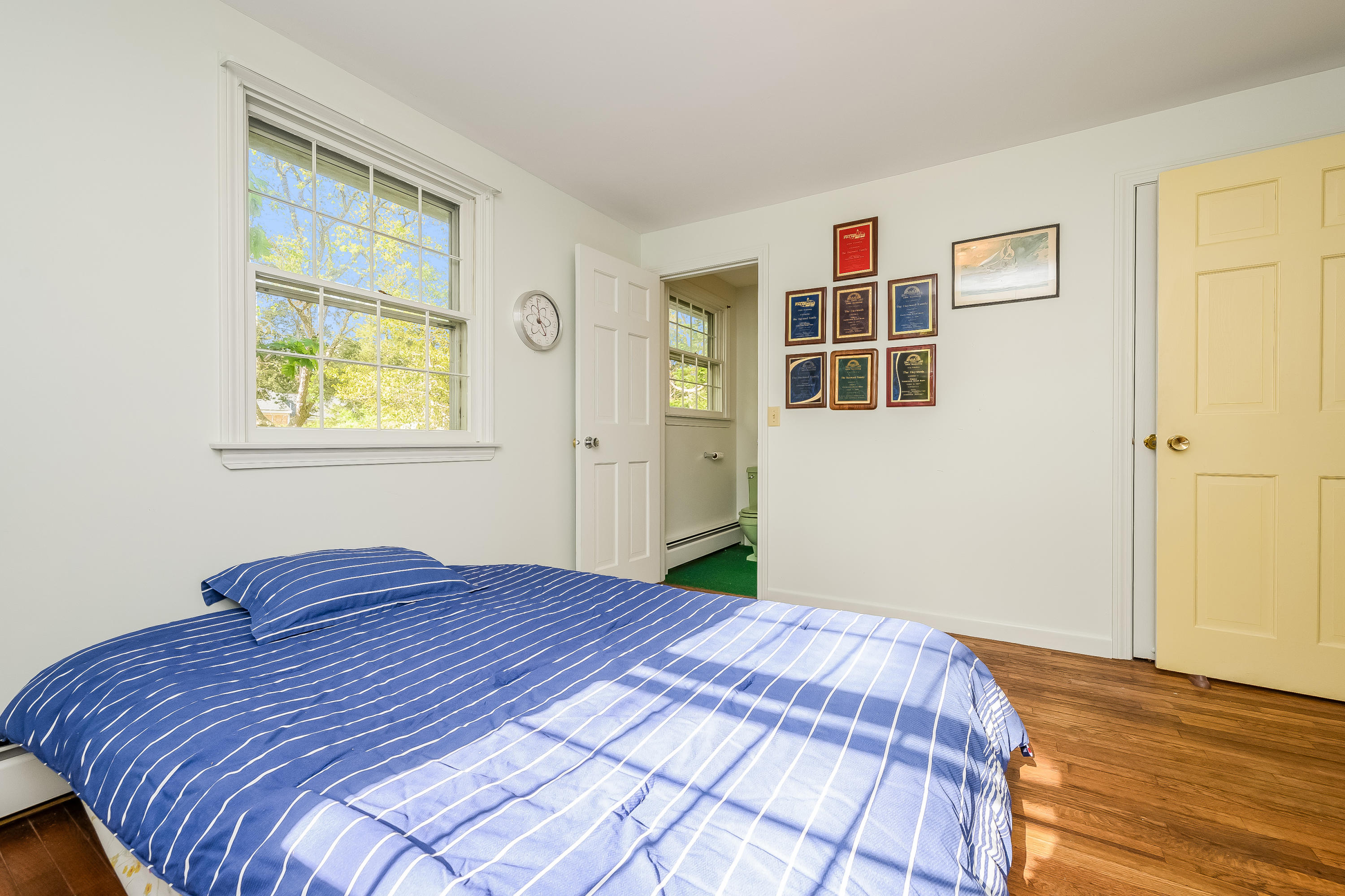 65 Chase Road Falmouth, MA 02540 - Photo 13 of 28 a bedroom with a bed and a window