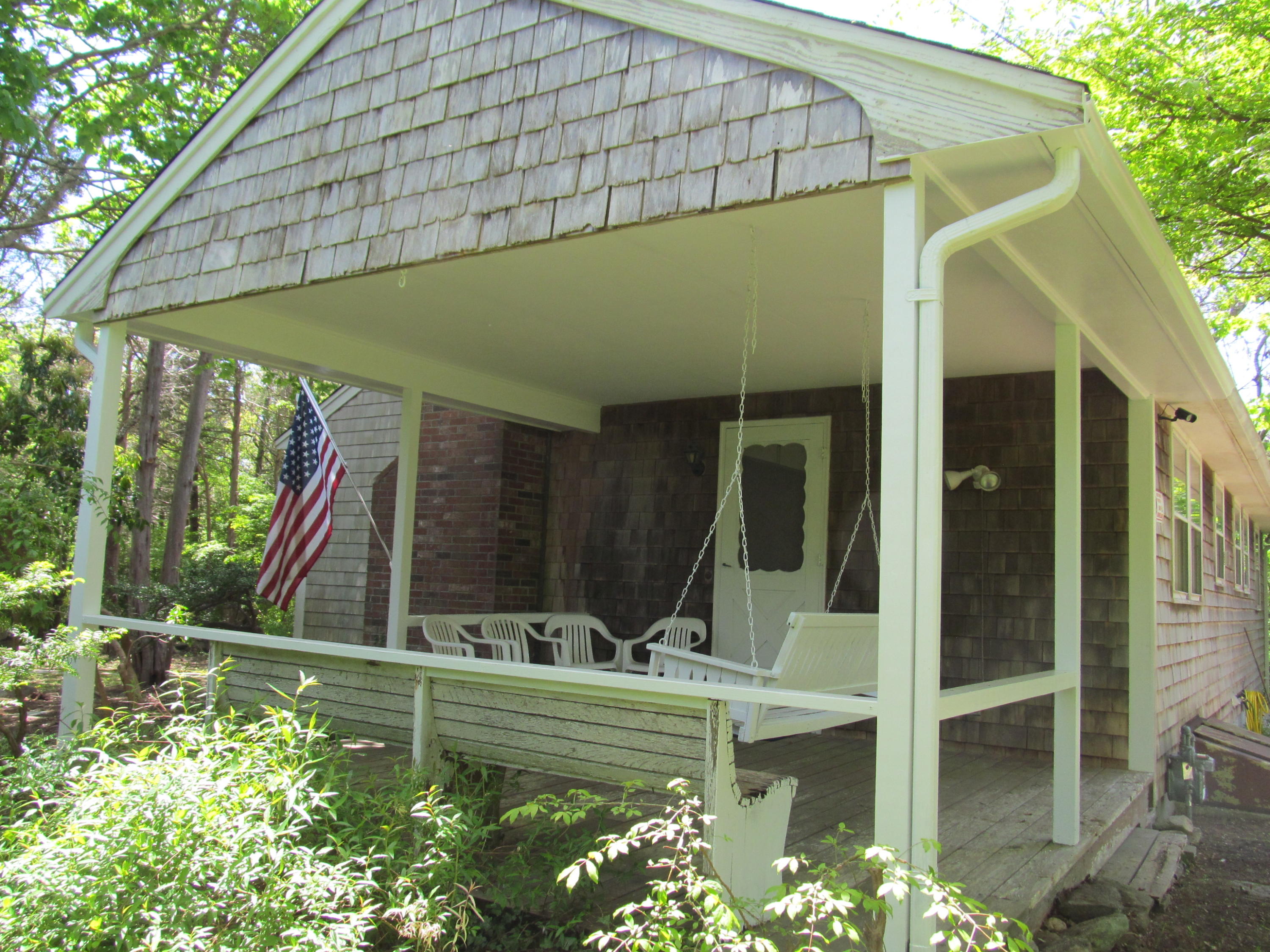 65 Chase Road Falmouth, MA 02540 - Photo 18 of 28 a view of backyard with swimming pool and outdoor seating