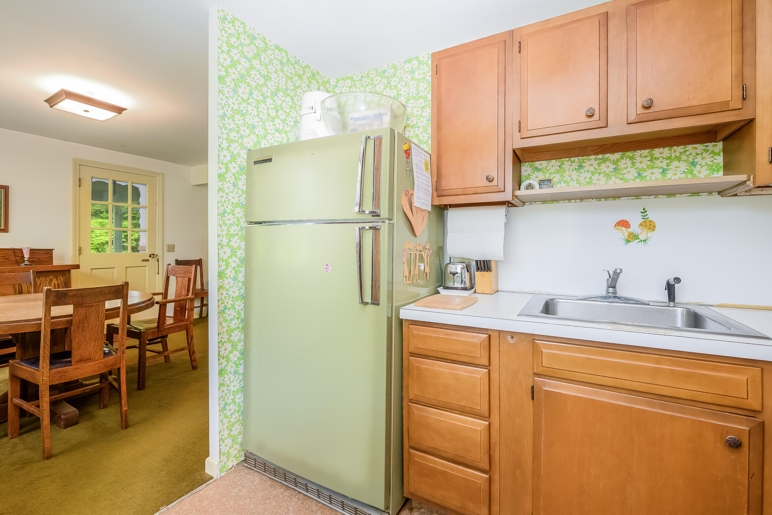 65 Chase Road Falmouth, MA 02540 - Photo 8 of 28 a kitchen with a sink cabinets and appliances