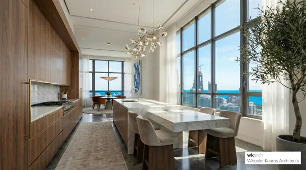 a kitchen with stainless steel appliances granite countertop a stove and a refrigerator