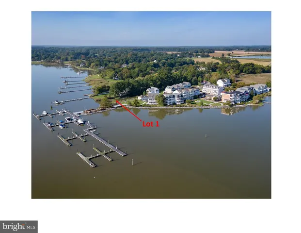 a picture of a room with a fireplace lake view