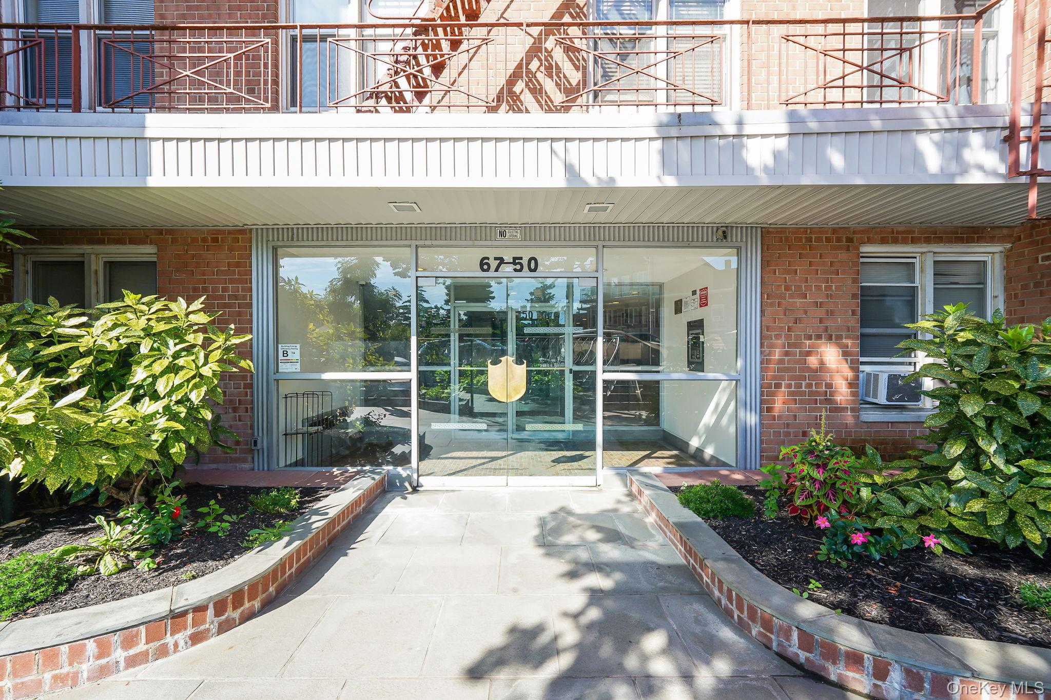 Property entrance with brick siding