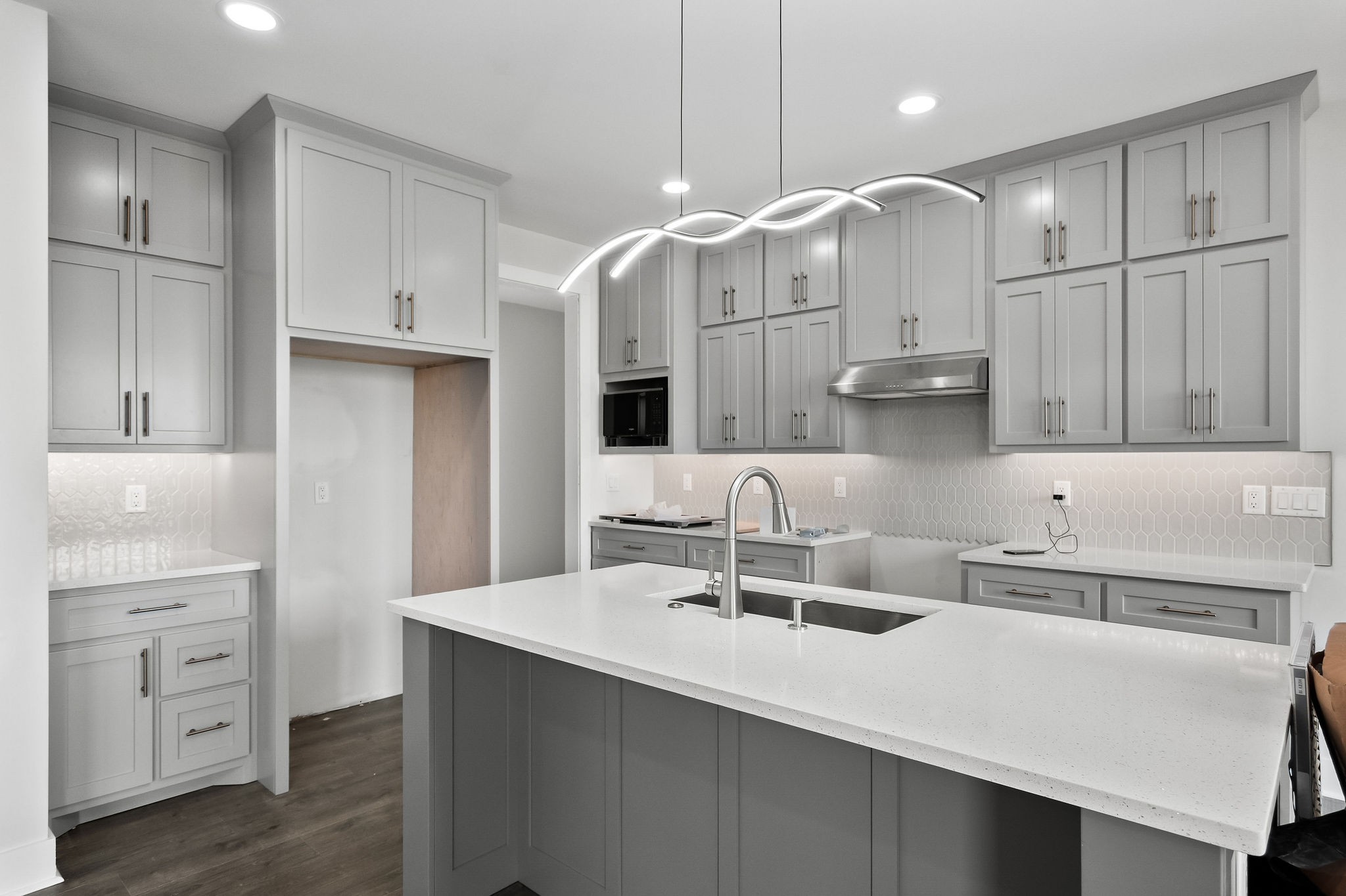 136 Dairy Barn Road Sparta, TN 38583 - Photo 13 of 16 a kitchen with cabinets a sink and a stove