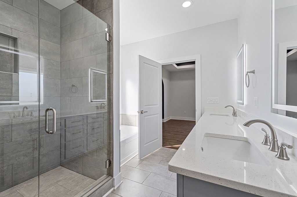 136 Dairy Barn Road Sparta, TN 38583 - Photo 27 of 58 a bathroom with a sink and a shower