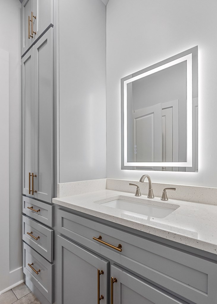 136 Dairy Barn Road Sparta, TN 38583 - Photo 46 of 58 a bathroom with a sink and a mirror