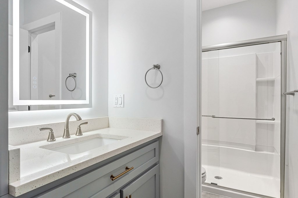 136 Dairy Barn Road Sparta, TN 38583 - Photo 47 of 58 a bathroom with a sink and a mirror
