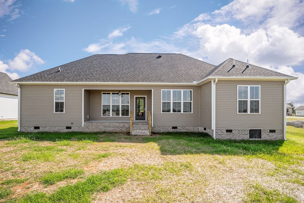 136 Dairy Barn Road Sparta, TN 38583 - Photo 51 of 58 a view of a house with a yard