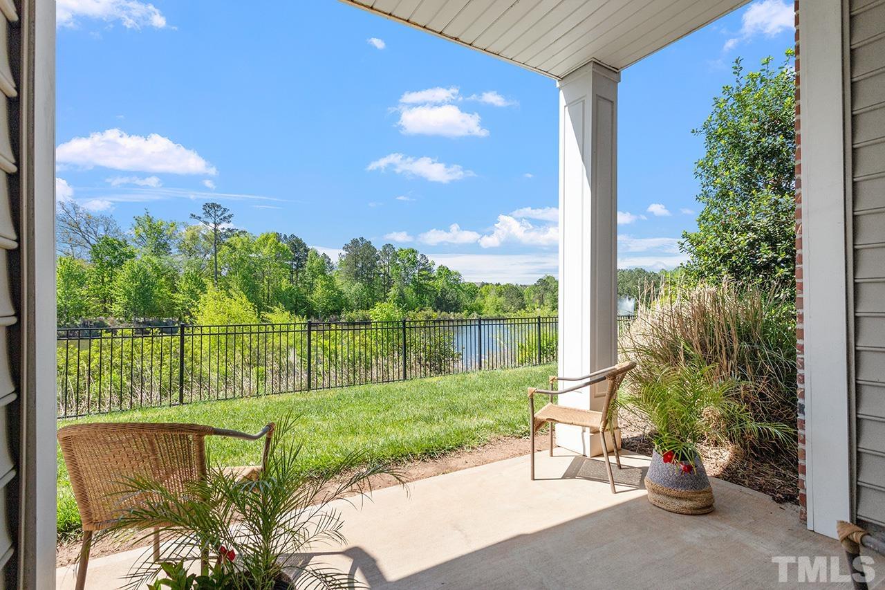 10421 Rosegate Court, Unit 5 Raleigh, NC 27617 - Photo 19 of 35 a view of a garden with a lake view