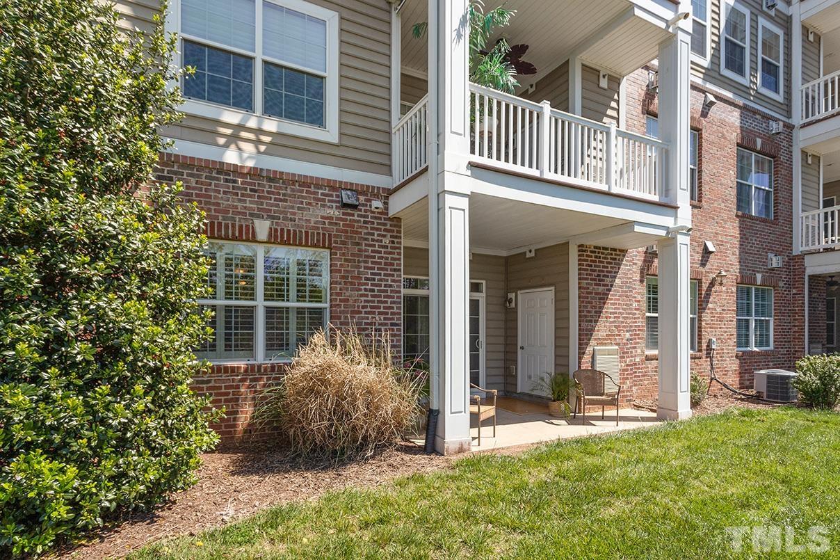 10421 Rosegate Court, Unit 5 Raleigh, NC 27617 - Photo 20 of 35 front view of a house with a yard