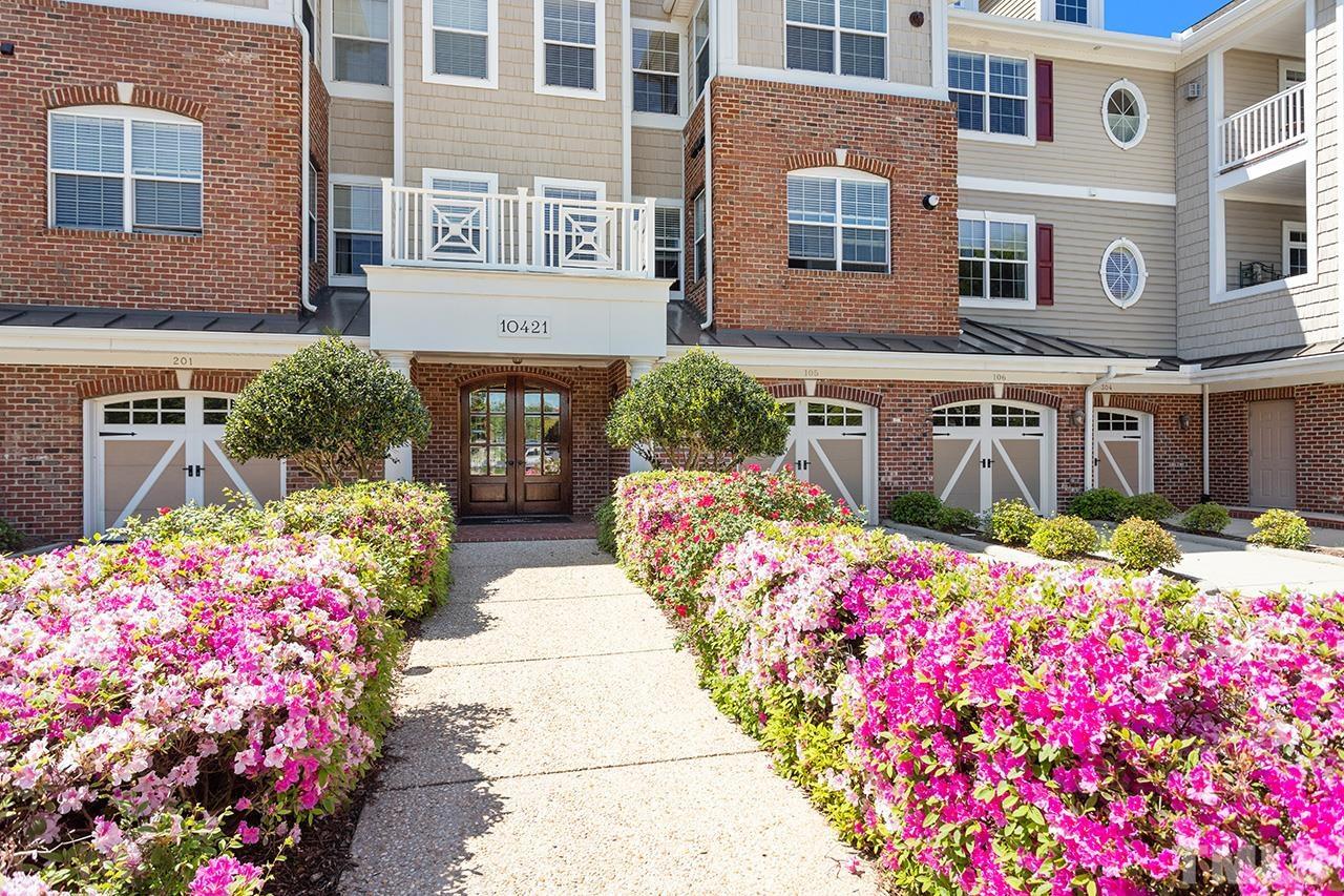 10421 Rosegate Court, Unit 5 Raleigh, NC 27617 - Photo 2 of 35 a front view of multi story residential apartment building