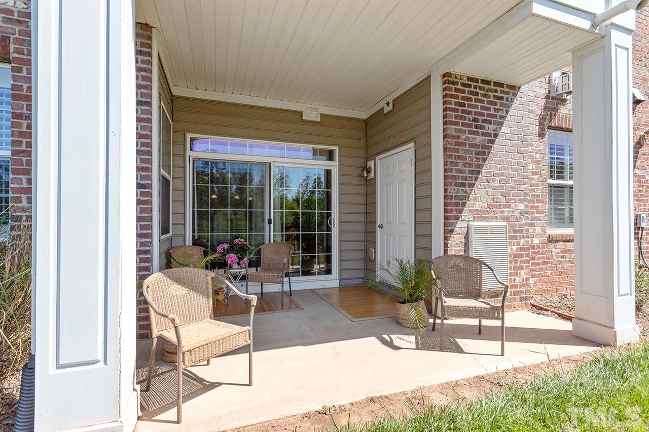 10421 Rosegate Court, Unit 5 Raleigh, NC 27617 - Photo 21 of 35 a view of a lobby with chair and tables