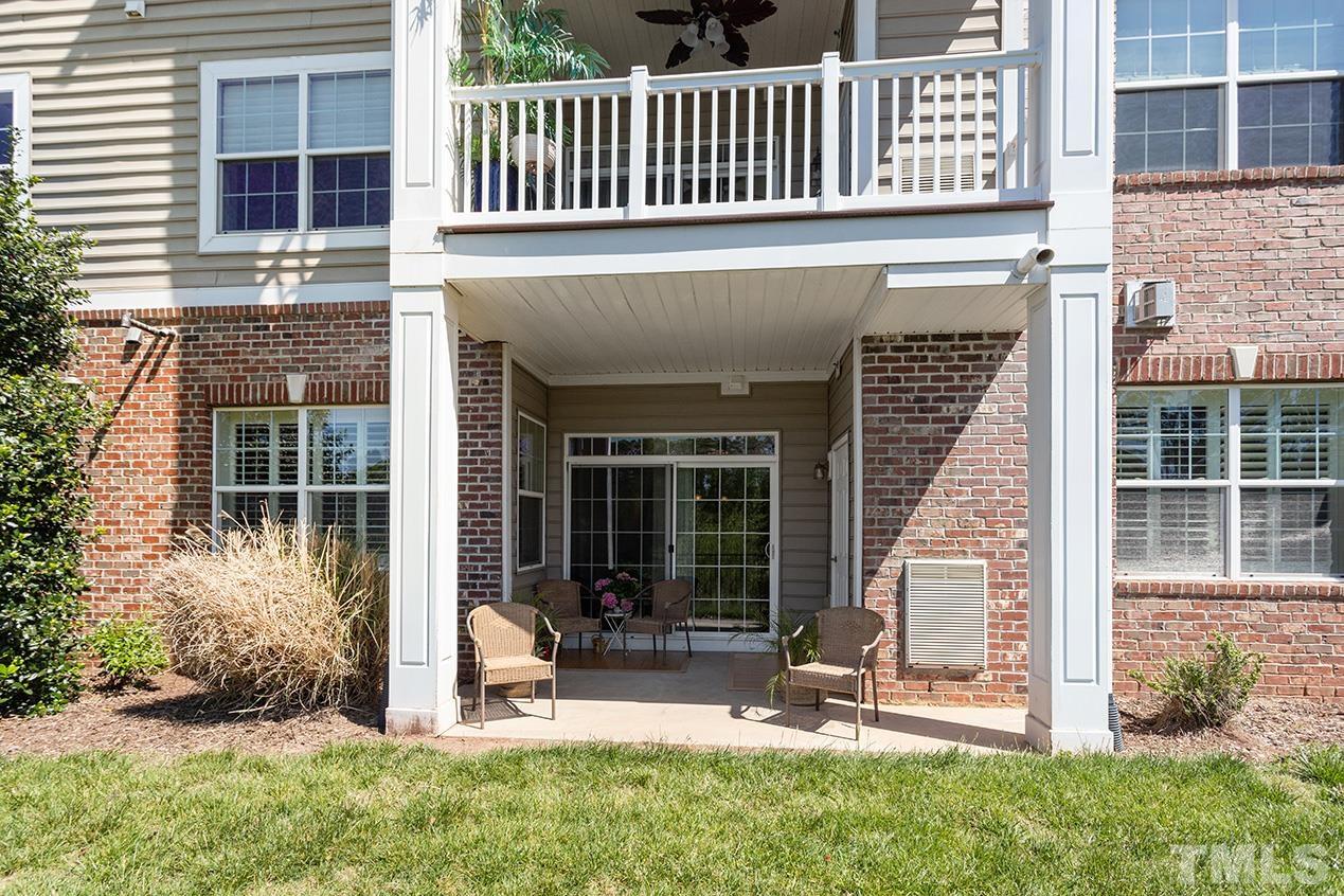 10421 Rosegate Court, Unit 5 Raleigh, NC 27617 - Photo 23 of 35 a view of a house with backyard and porch