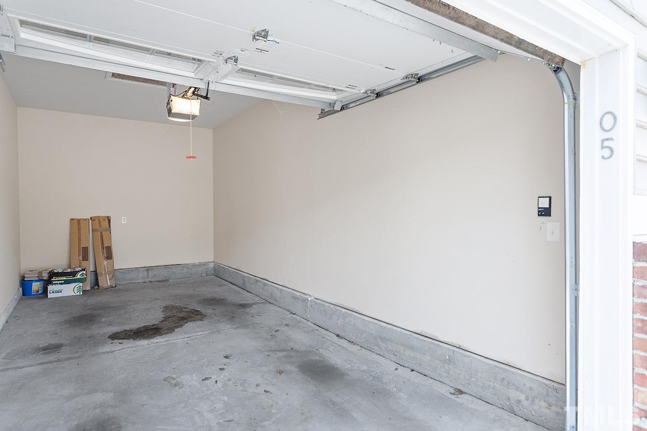 10421 Rosegate Court, Unit 5 Raleigh, NC 27617 - Photo 34 of 35 a view of a room with rack on the wall