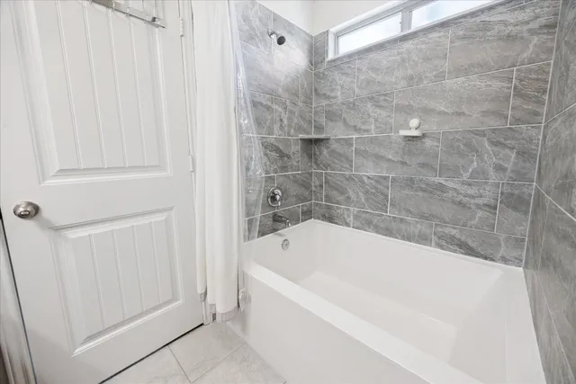 a bathroom with a bathtub