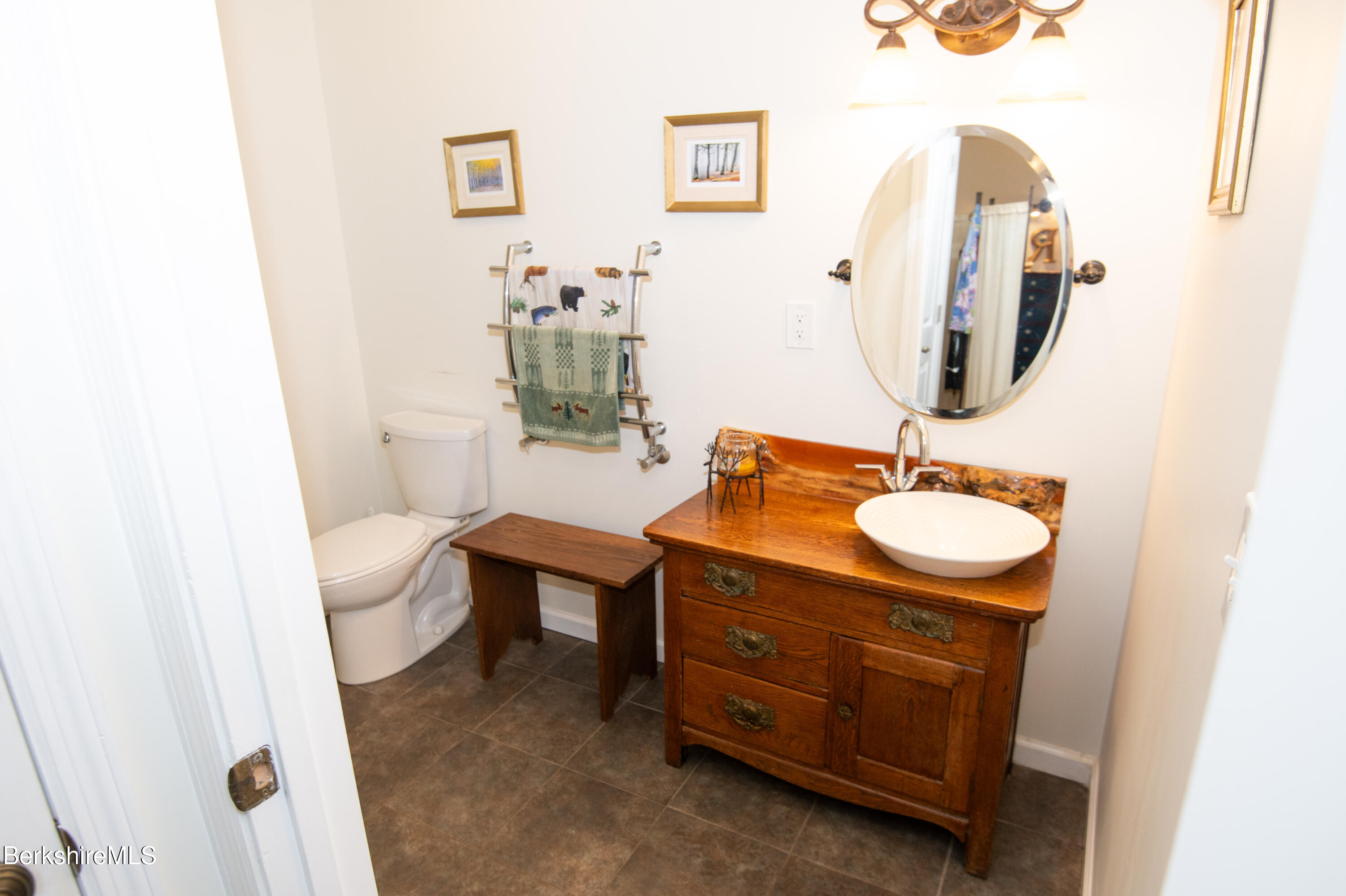 107 Wilderness Way Stephentown, NY 12169 - Photo 22 of 33 a bathroom with a sink a toilet and a mirror