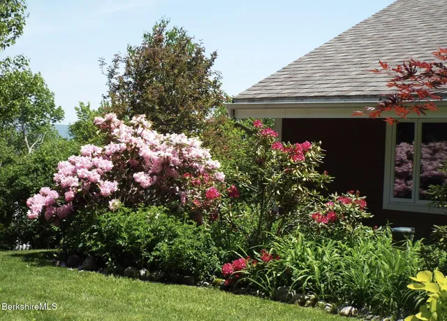 a view of balcony with furniture