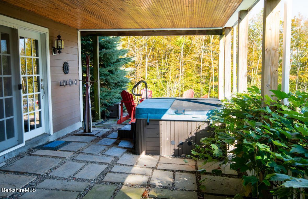 107 Wilderness Way Stephentown, NY 12169 - Photo 28 of 33 a front view of a house with a yard