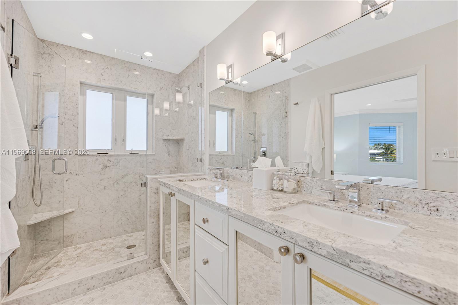 26 Marlin Lane, Unit B Key Largo, FL 33037 - Photo 7 of 16 a bathroom with a granite countertop sink mirror and double